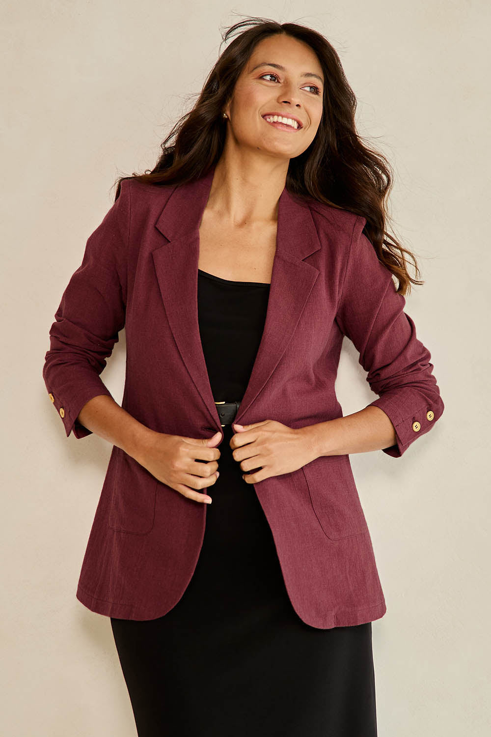 Model Tahnee wearing size 10 of the Cotton Linen Longline Blazer in colour Wine (Red), from the front, showing the whole outfit