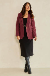 Model Tahnee wearing size 10 of the Cotton Linen Longline Blazer in colour Wine (Red), from the front, showing the whole outfit