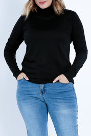 Model Jess wearing size 14 of the Merino Wool Skivvy in colour Black (Black), from the front, cropped image