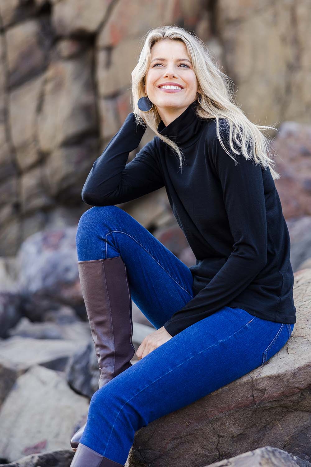 Model Kelly wearing size 10 of the Merino Wool Skivvy in colour Black (Black), from the front, showing the whole outfit