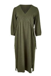 Product shot of the Ramie Empire Line Dress in colour Green (Green), from the front