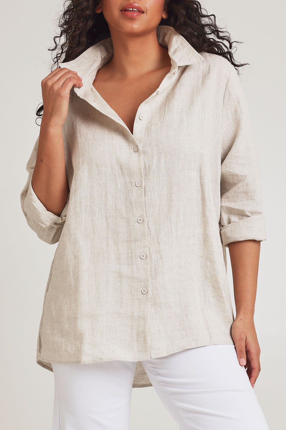 Model Terri-Leigh wearing size 14 of the Linen Oversized Boyfriend Shirt in colour Sand, from the front, cropped image