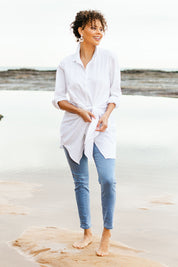Model Lala wearing size 10 of the Cotton Front Tie Tunic in colour White (White), from the front, showing the whole outfit
