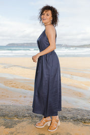 Model Lala wearing size 10 of the Linen Halter Neck Dress in colour Blue (Blue), from the front, showing the whole outfit