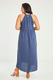 Model Terri-Leigh wearing size 14 of the Linen Halter Neck Dress in colour Blue (Blue), from the back