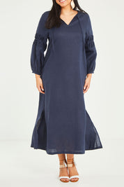 Model Terri-Leigh wearing size 14 of the Linen Honeycomb Sleeve Dress in colour Navy (Blue), from the front, cropped image