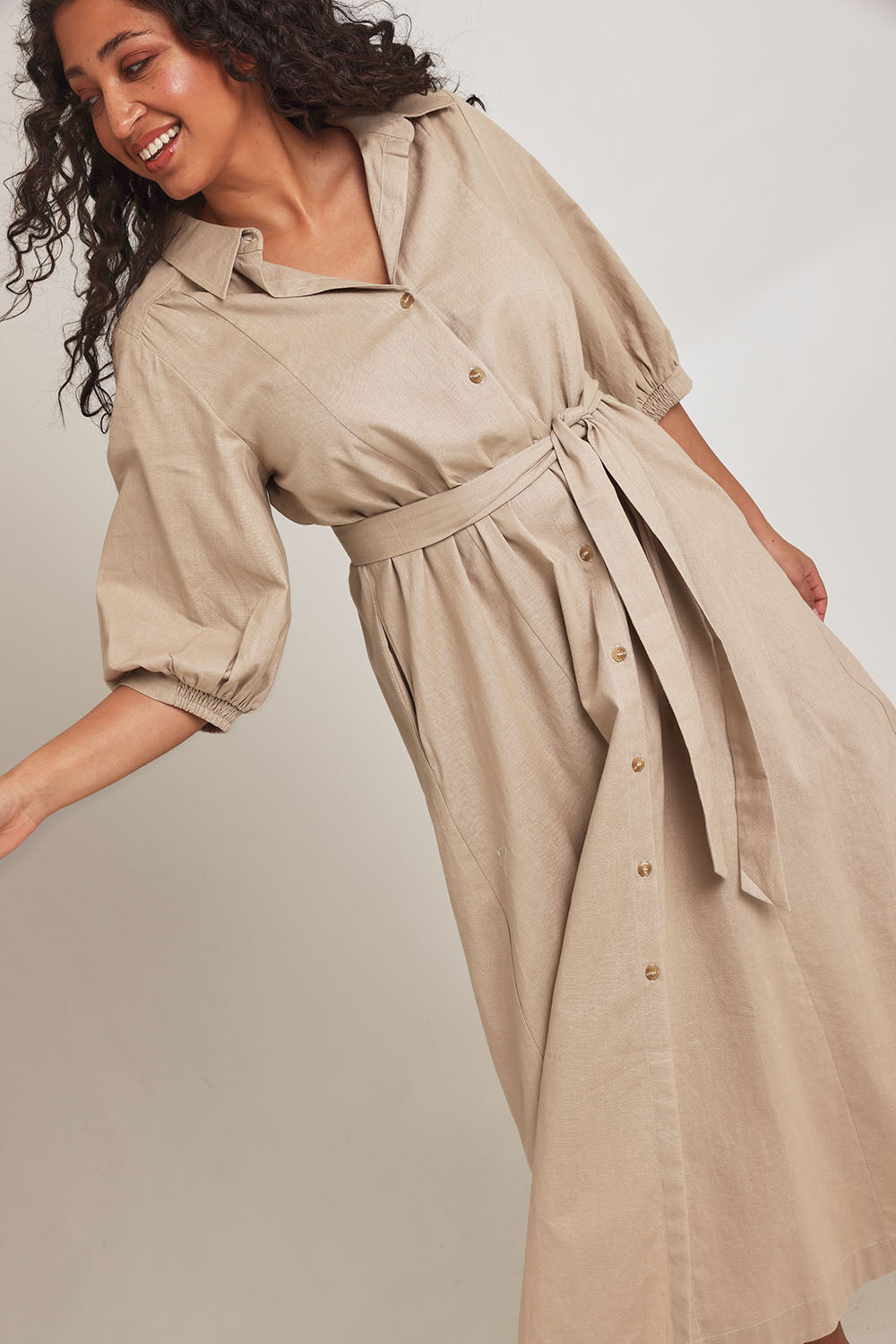 Model Terri-Leigh wearing size 14 of the Linen Cotton Maxi Shirt Dress in colour Natural, from the front, cropped image