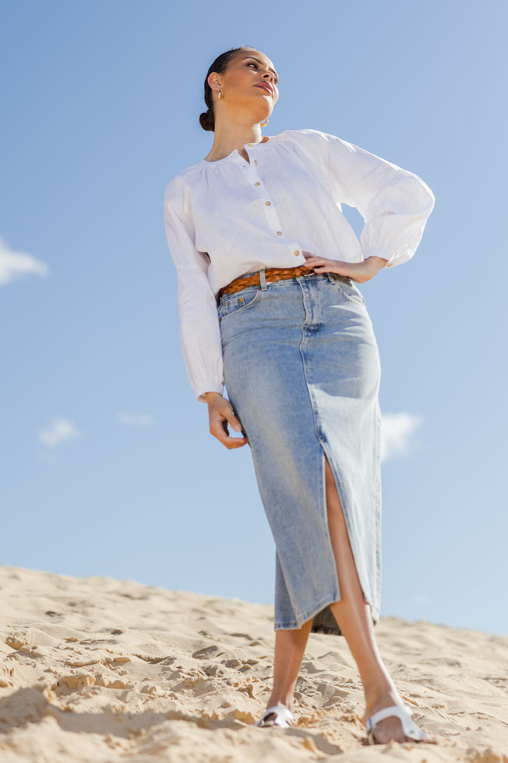 Model Lala wearing size 10 of the Relaxed Linen Blouse in colour White (White), from the front, showing the whole outfit