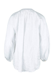 Product shot of the Relaxed Linen Blouse in colour White (White), from the back