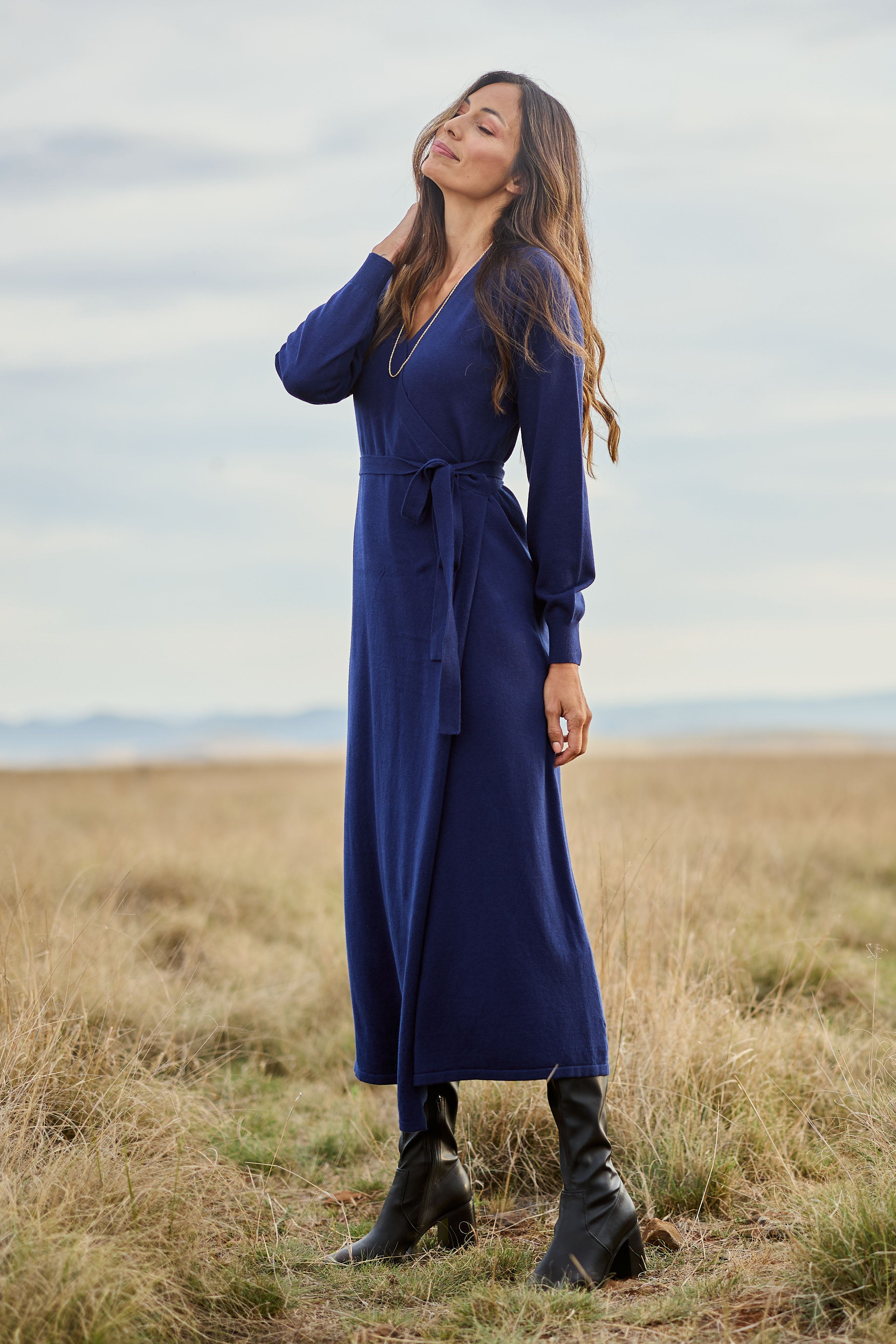 Model Amanda wearing size S of the Cotton Cashmere Wrap Dress in colour Navy (Blue), from the front, showing the whole outfit