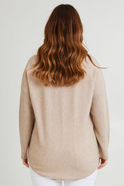 Model Laura wearing size L of the Wool Cashmere V Sweater in colour Natural, from the back
