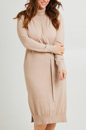 Model Laura wearing size L of the Cotton Cashmere Wool Knit Dress in colour Oatmeal, from the front, cropped image