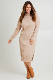 Model Laura wearing size L of the Cotton Cashmere Wool Knit Dress in colour Oatmeal, from the front, showing the whole outfit