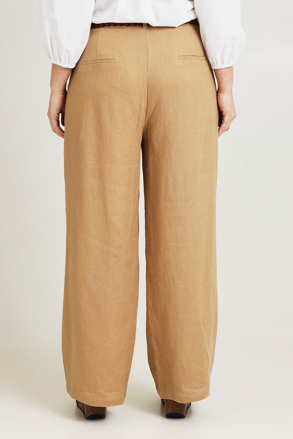 Model Jane wearing size 14 of the Linen Straight Leg Pant in colour Brownsugar, from the back