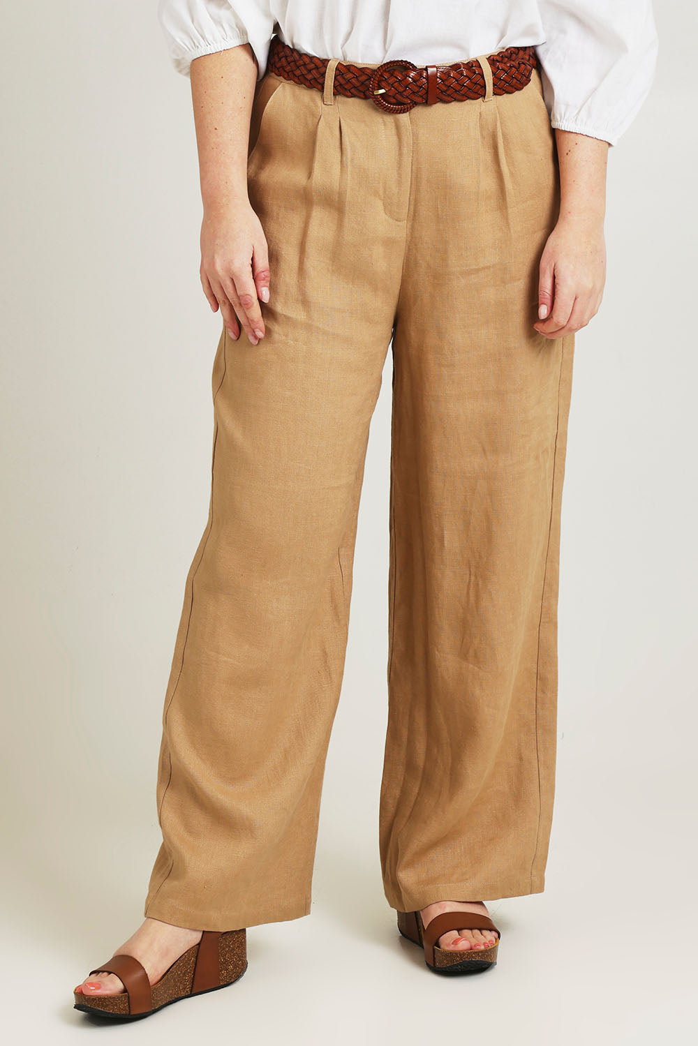 Model Jane wearing size 14 of the Linen Straight Leg Pant in colour Brownsugar, from the front, cropped image
