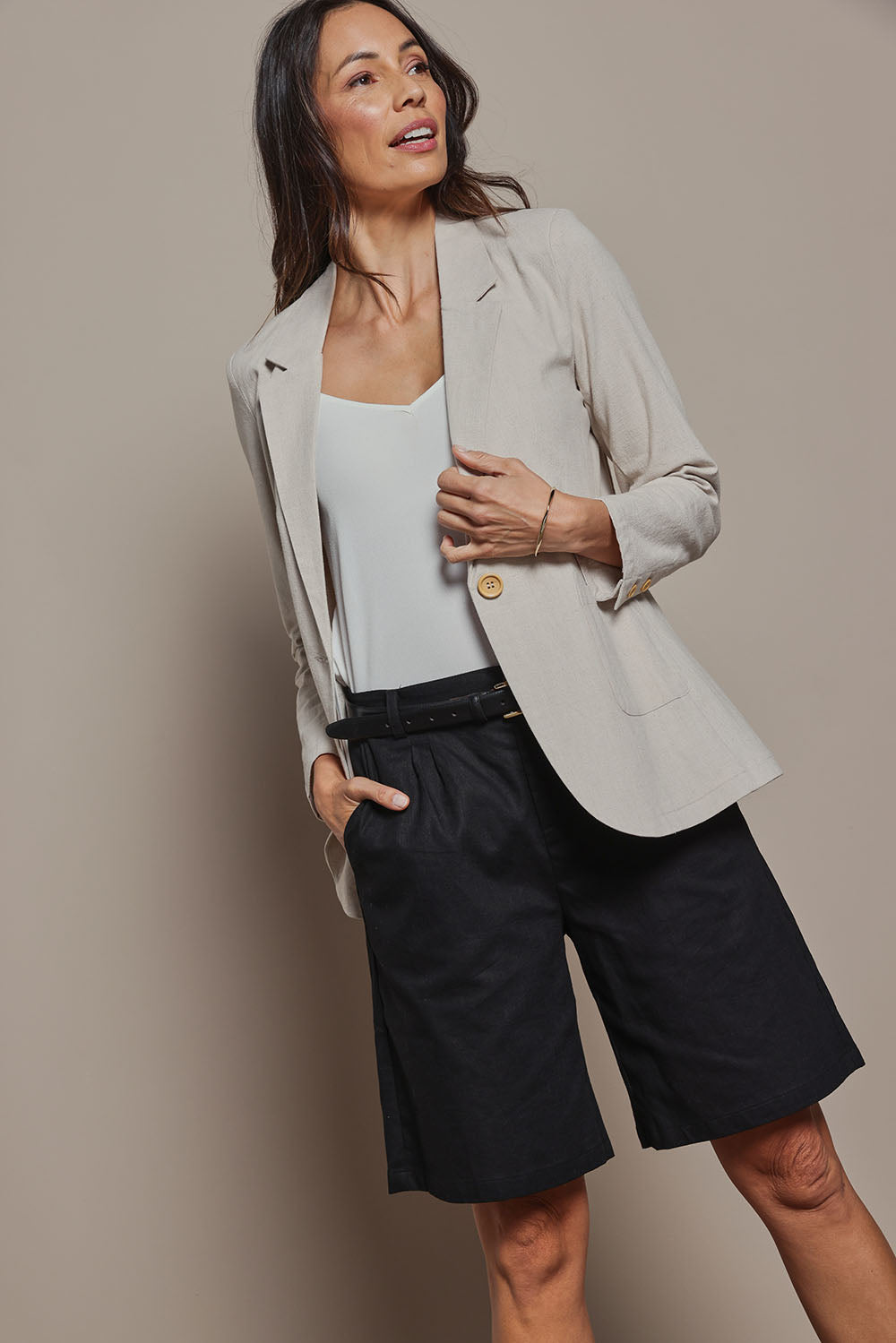 Model Amanda wearing size 10 of the Linen Cotton Long Short in colour Black (Black), from the front, cropped image
