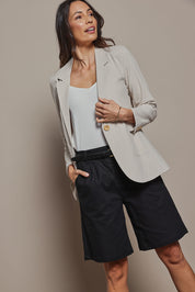 Model Amanda wearing size 10 of the Linen Cotton Long Short in colour Black (Black), from the front, cropped image