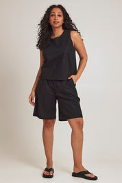 Model Terri-Leigh wearing size 14 of the Linen Cotton Long Short in colour Black (Black), from the front, showing the whole outfit