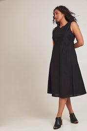 Model Terri-Leigh wearing size 14 of the Linen Cotton Midi Bias Dress in colour Black (Black), from the front, showing the whole outfit