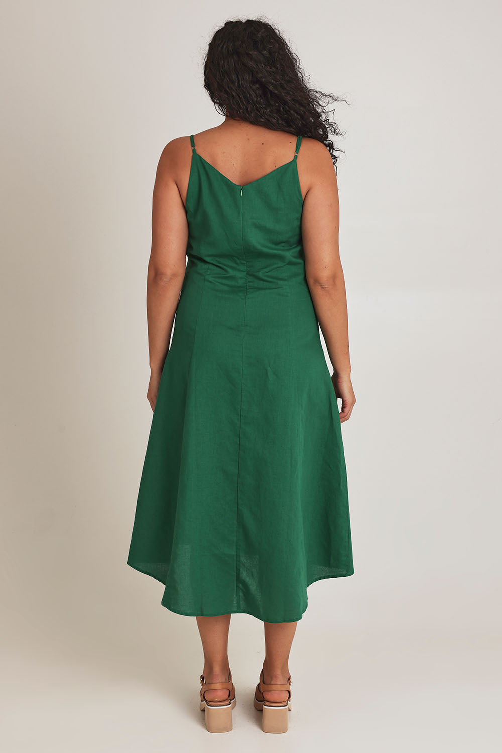 Model Terri-Leigh wearing size 14 of the Linen Cotton Summer Midi Dress in colour Fern (Green), from the back