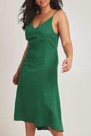 Model Terri-Leigh wearing size 14 of the Linen Cotton Summer Midi Dress in colour Fern (Green), from the front, cropped image