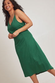 Model Terri-Leigh wearing size 14 of the Linen Cotton Summer Midi Dress in colour Fern (Green), from the front, cropped image