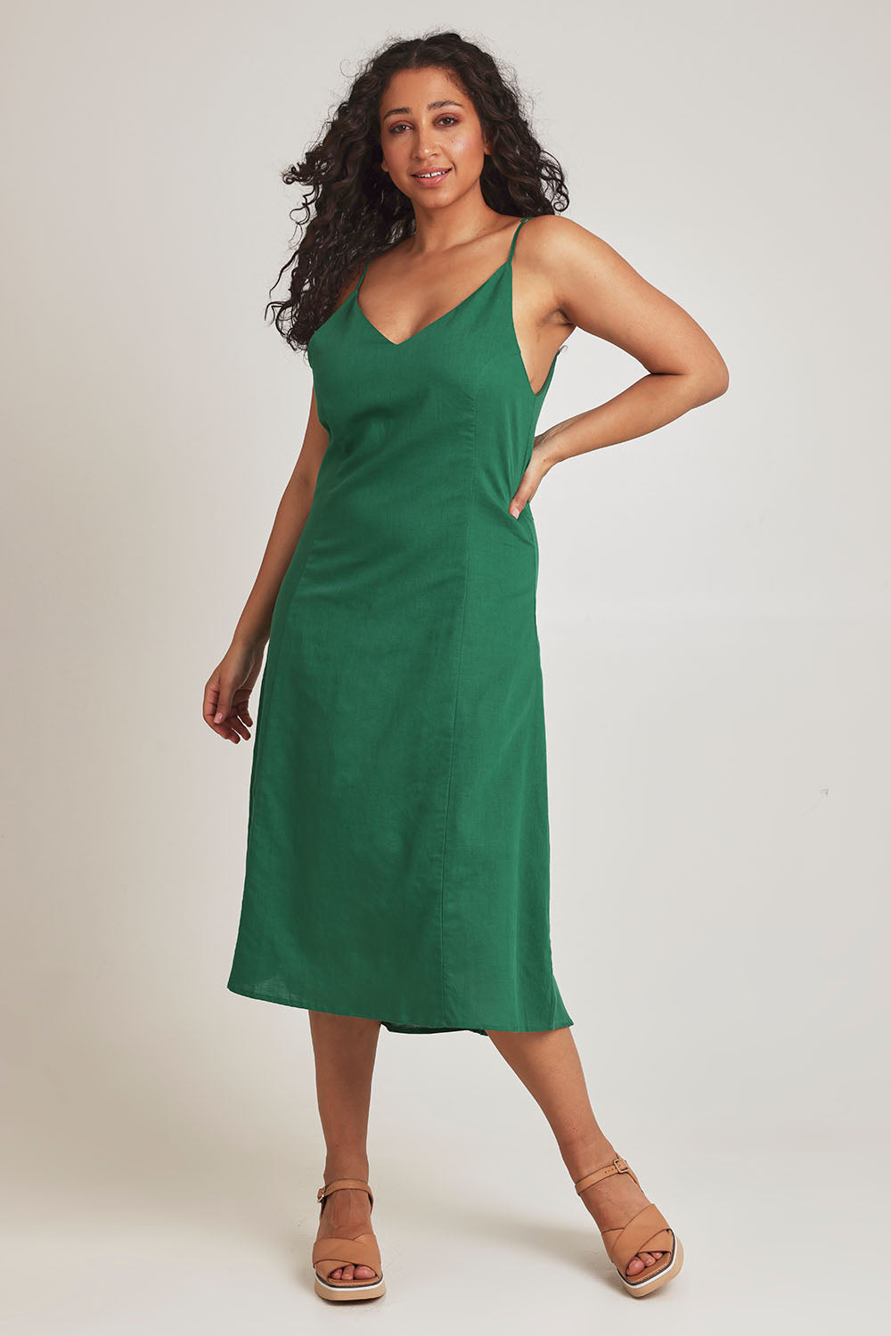 Model Terri-Leigh wearing size 14 of the Linen Cotton Summer Midi Dress in colour Fern (Green), from the front, showing the whole outfit