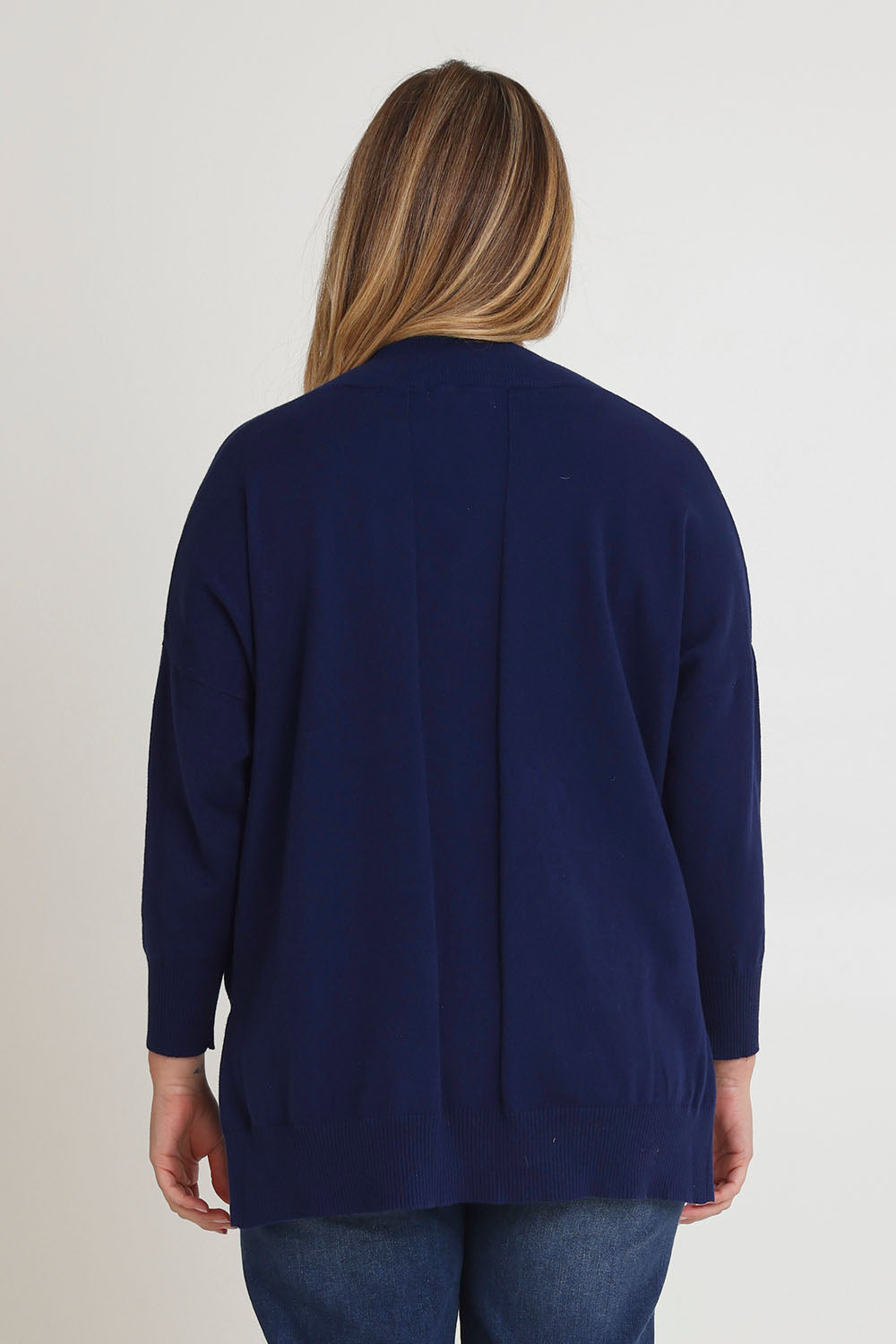Model Chanel wearing size XL of the Cotton Cashmere V Neck Sweater in colour Navy (Blue), from the back