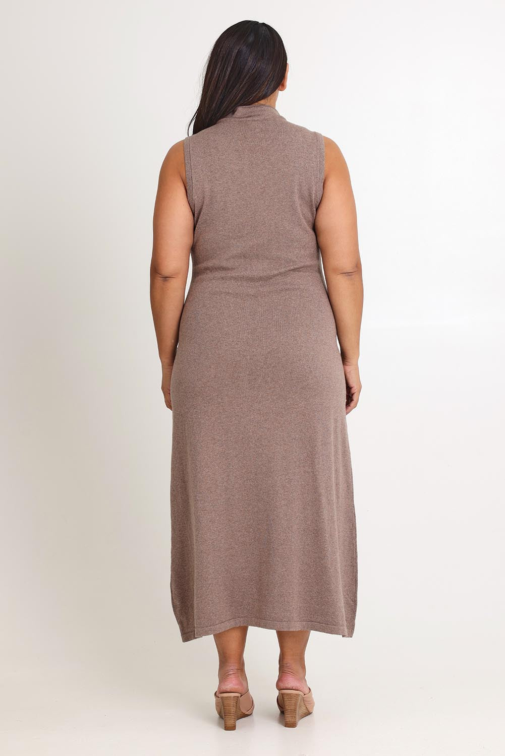 Model Ashleigh wearing size XL of the Cotton Cashmere Sleeveless Layering Dress in colour Natural, from the back