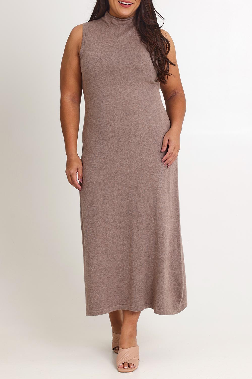 Model Ashleigh wearing size XL of the Cotton Cashmere Sleeveless Layering Dress in colour Natural, from the front, cropped image