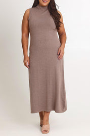 Model Ashleigh wearing size XL of the Cotton Cashmere Sleeveless Layering Dress in colour Natural, from the front, cropped image