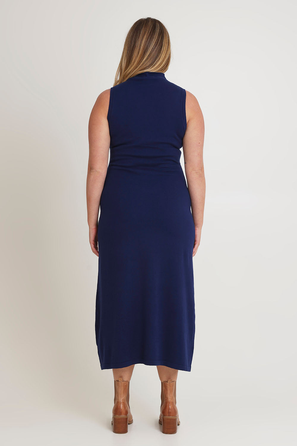 Model Chanel wearing size XL of the Cotton Cashmere Sleeveless Layering Dress in colour Navy (Blue), from the back