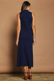 Model Madeline wearing size S of the Cotton Cashmere Sleeveless Layering Dress in colour Navy (Blue), from the back