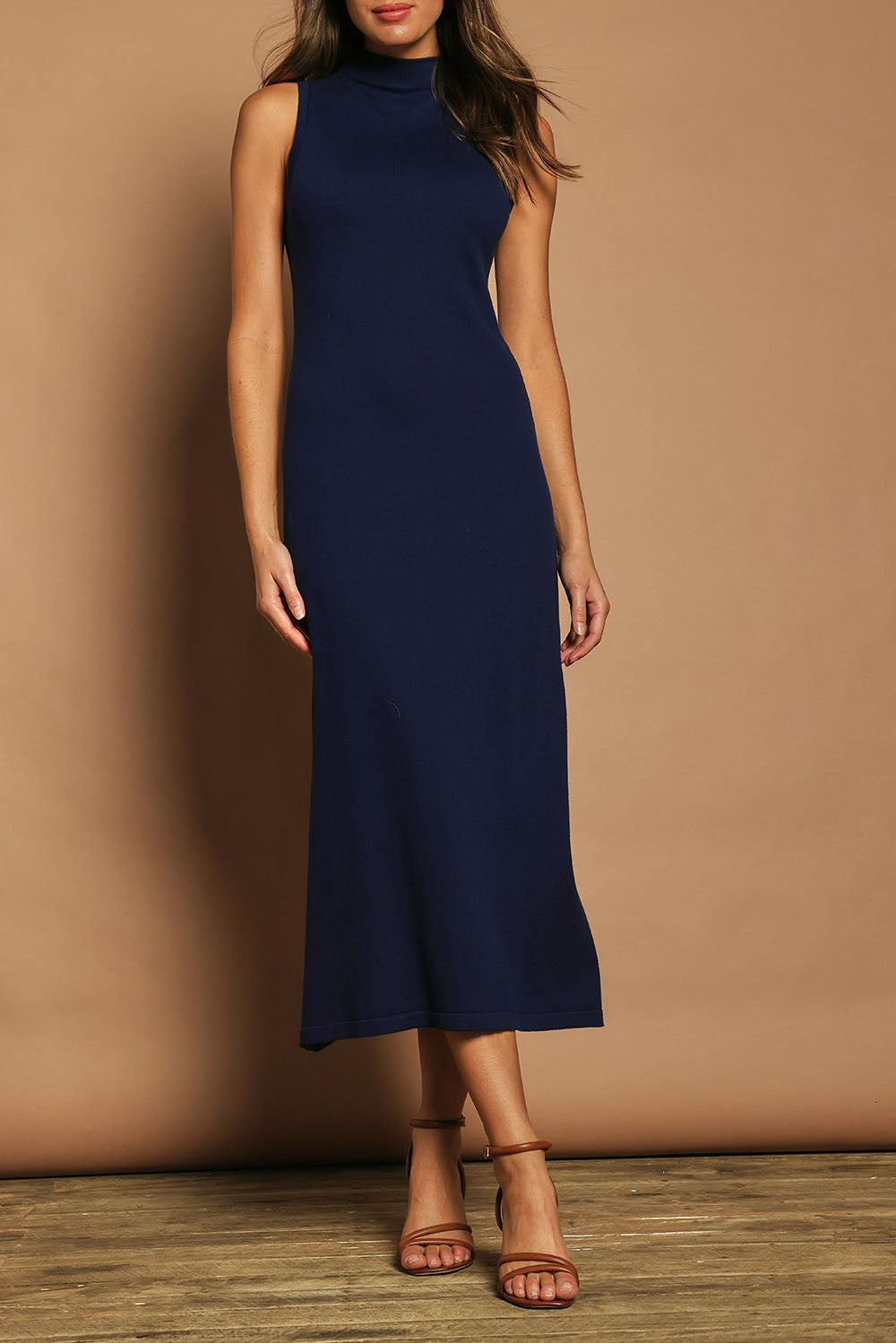 Model Madeline wearing size S of the Cotton Cashmere Sleeveless Layering Dress in colour Navy (Blue), from the front, cropped image