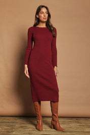 Model Madeline wearing size S of the Cotton Cashmere Boat Neck Dress in colour Berry (Red), from the front, showing the whole outfit