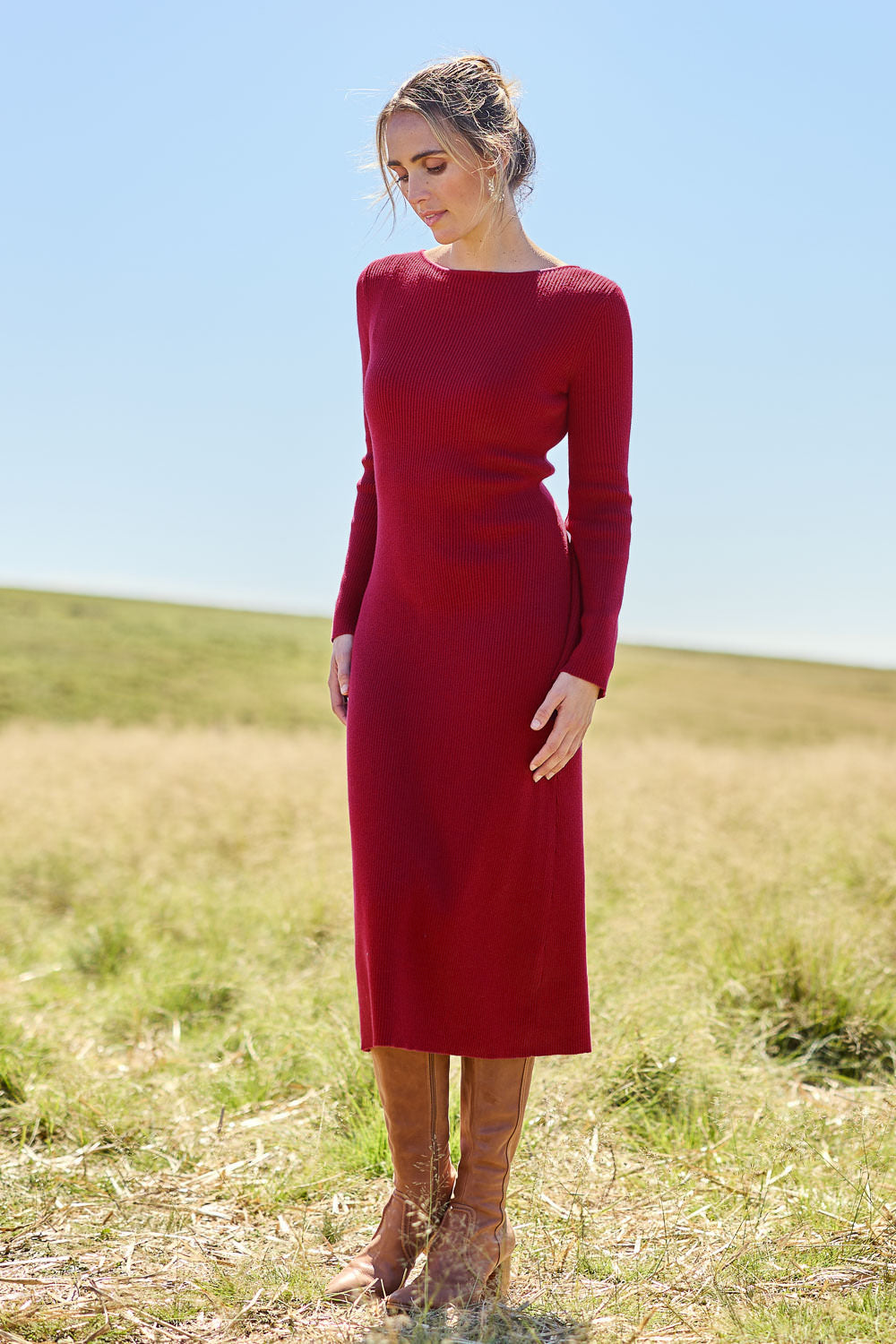 Model Tegan wearing size S of the Cotton Cashmere Boat Neck Dress in colour Berry (Red), from the front, showing the whole outfit