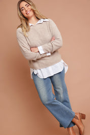 Model Chanel wearing size XL of the Wool Cashmere Shoulder Cable Knit Sweater in colour Fawn, from the front, showing the whole outfit