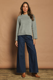 Model Madeline wearing size S of the Cotton Wool Cashmere Relaxed Jumper in colour Opalgrey (Grey), from the front, showing the whole outfit