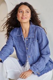 Model Tahneei wearing size 10 of the Linen Relaxed Jacket – Denim in colour Denim, in a cropped view