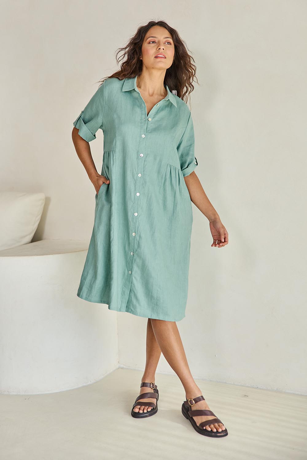 Model Tahneei wearing size 10 of the Linen Shirt Maker Dress – Aloe in colour Aloe, from the front