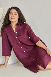Model Tahneei wearing size 10 of the Linen Shirt Maker Dress – Plum in colour Plum, from an angle