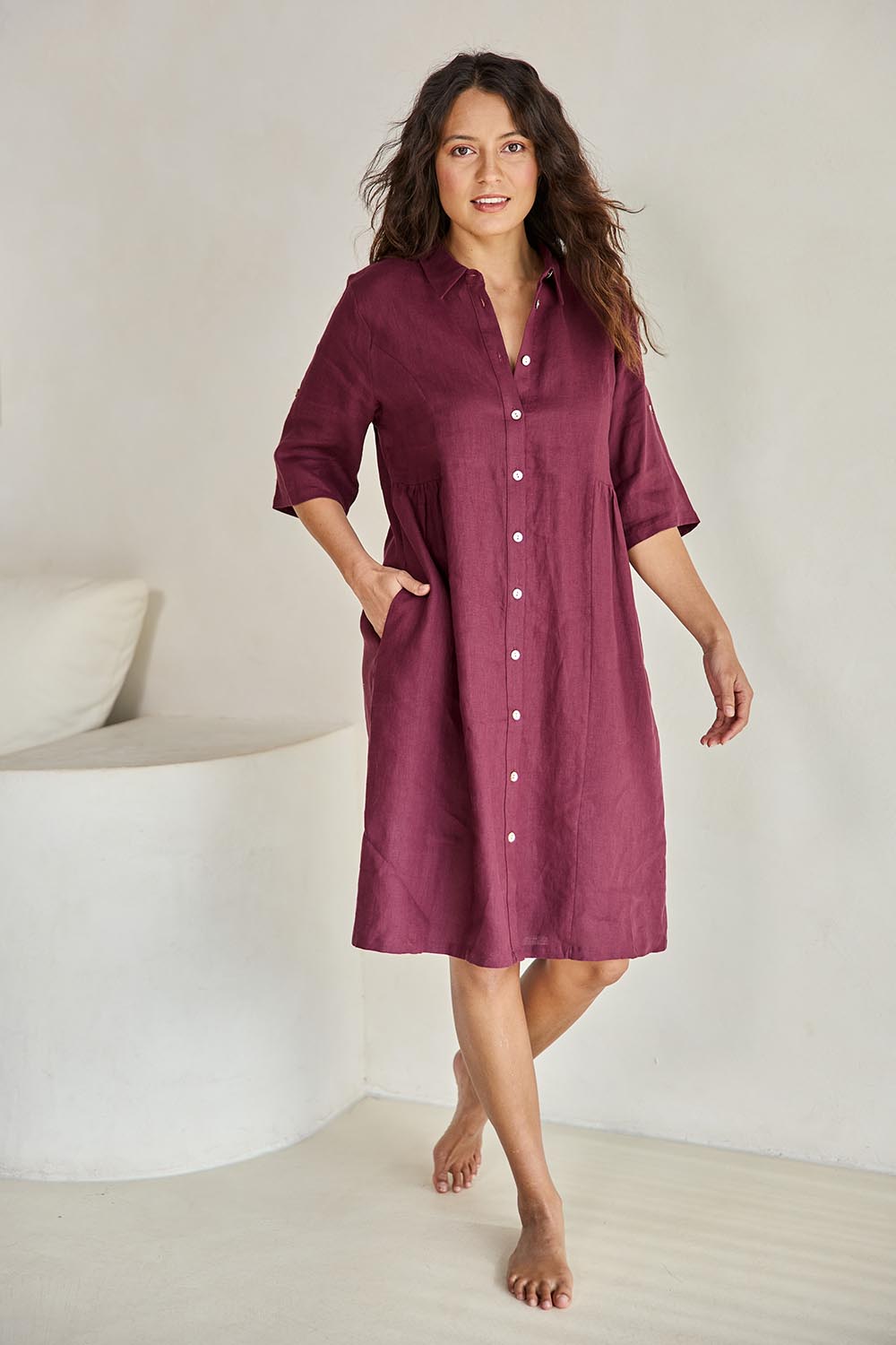 Model Tahneei wearing size 10 of the Linen Shirt Maker Dress – Plum in colour Plum, from the front