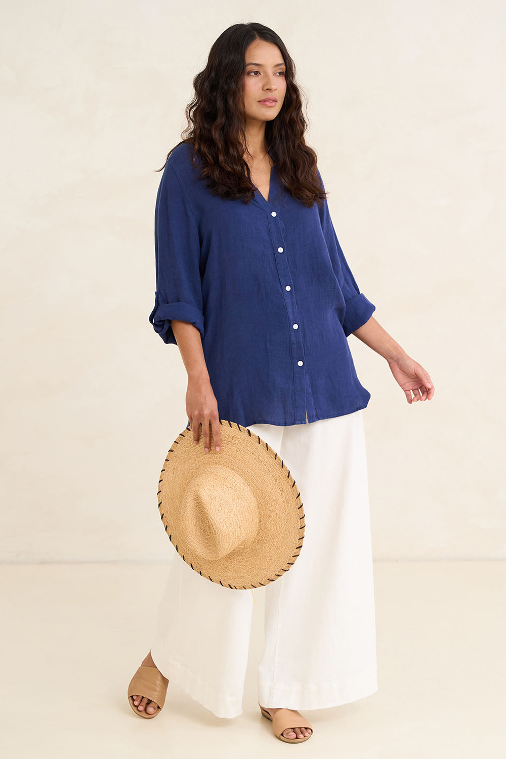 Model Tahnee wearing size 10 of the Linen Extra Soft Relaxed Shirt in colour Navy (Blue), from the front, showing the whole outfit
