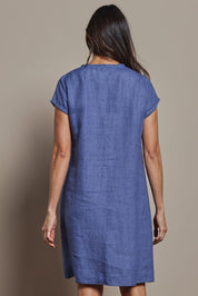 Model Amanda wearing size 10 of the Linen V Neck Shift Dress in colour Denim (Blue), from the back