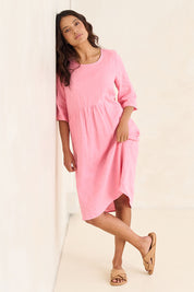 Model Tahnee wearing size 10 of the Linen Pocket Dress in colour Blush (Pink), from the front, showing the whole outfit