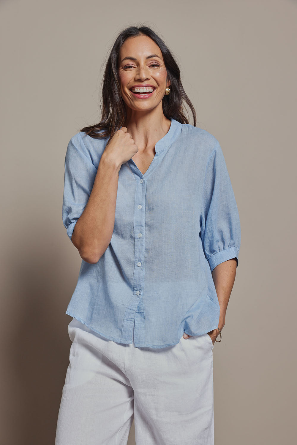 Model Amanda wearing size 10 of the Cotton Button Down Blouse in colour Blue (Blue), from the front, cropped image