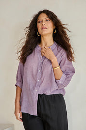 Model Tahneei wearing size 10 of the Cotton Button Down Blouse – Grape in colour Grape, in a cropped view
