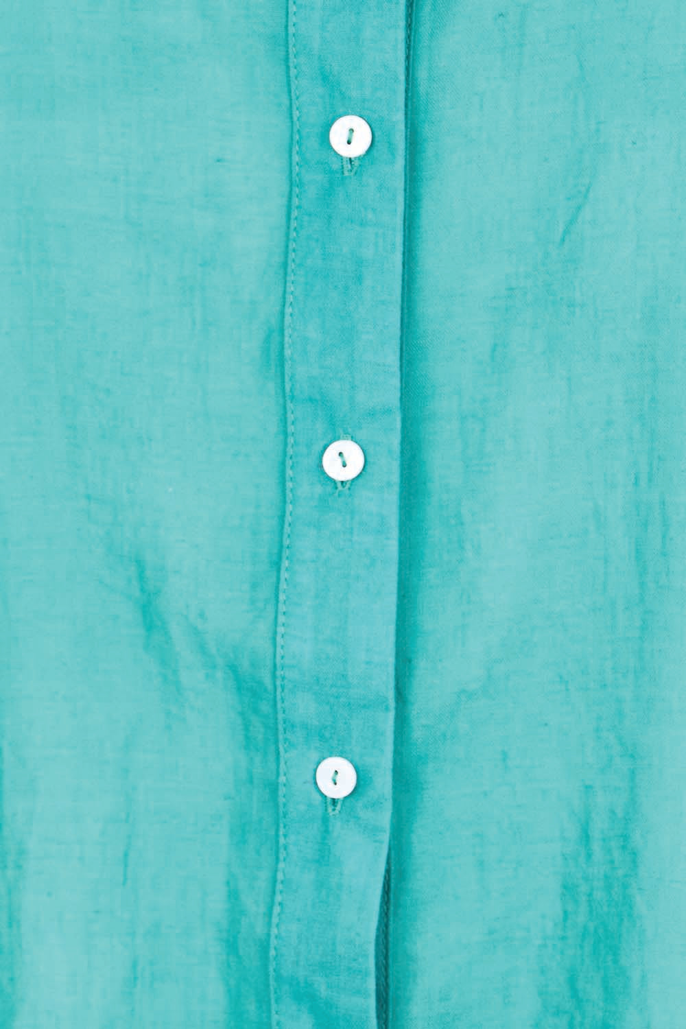 Product shot of the Cotton Button Down Blouse – Lagoon in colour Lagoon, showing detail