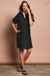 Model Amanda wearing size 10 of the Linen Throw On Dress in colour Black (Black), from the front, showing the whole outfit