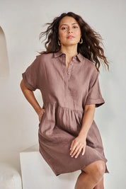 Model Tahneei wearing size 10 of the Linen Throw On Dress – Coffee in colour Coffee, in a cropped view